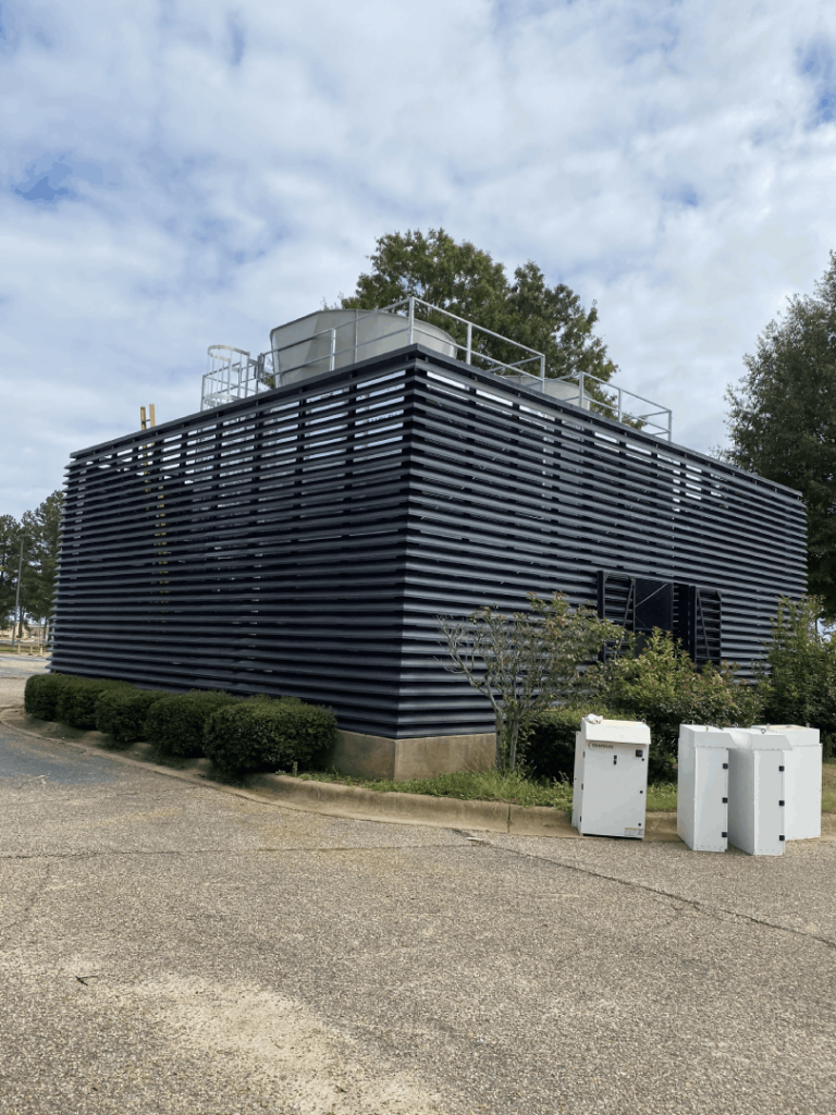 A picture of a cooling tower.